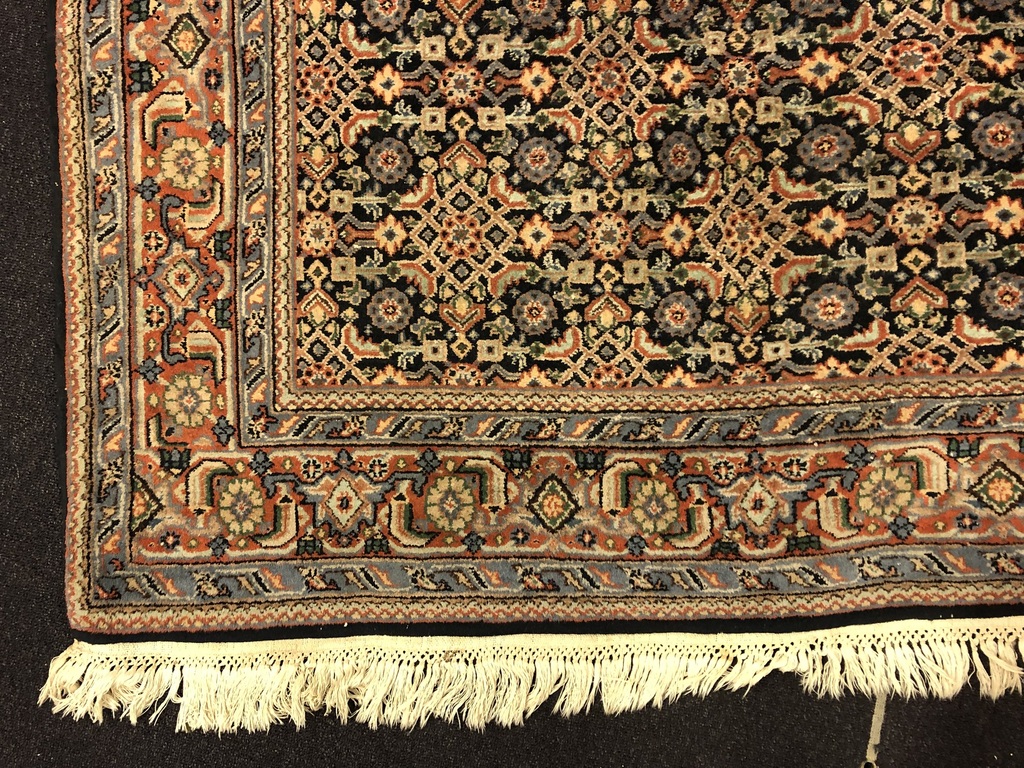 Hand-woven wool carpet