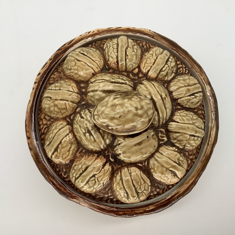 A butter dish with a lid in the shape of a basket filled with walnuts. Plant of M.S. Kuznetsov in Tver.