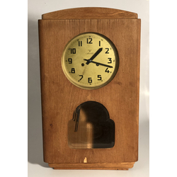 Wall clock with valve