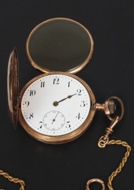 Gold pocket watch with gold chain