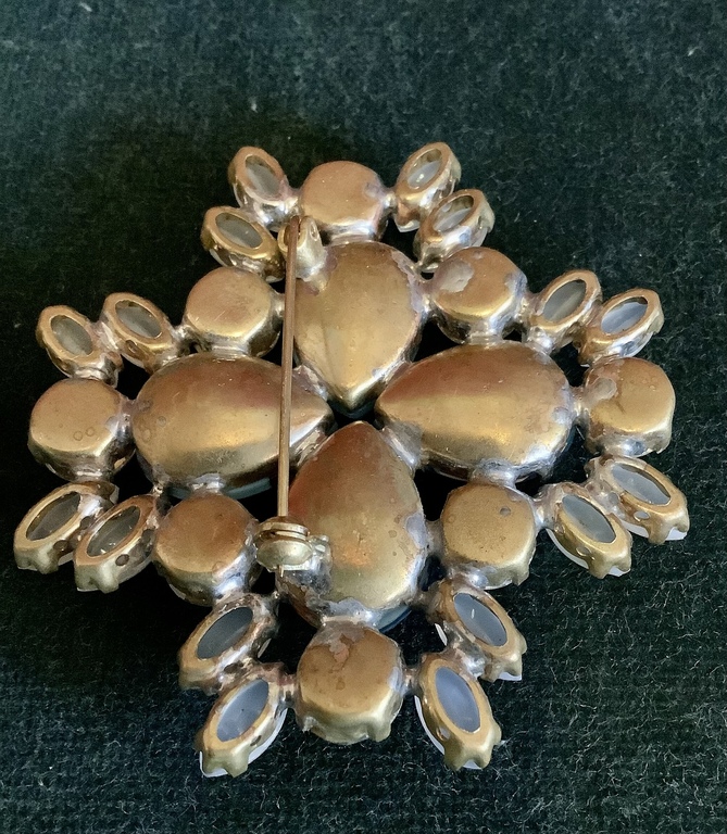 Large brooch with natural rhinestones. Petals made of porcelain and smoked milk glass. Handmade from the beginning of the last century.