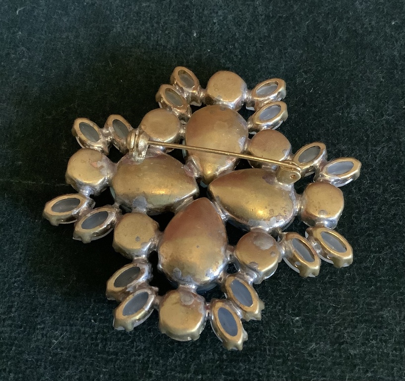 Large brooch with natural rhinestones. Petals made of porcelain and smoked milk glass. Handmade from the beginning of the last century.