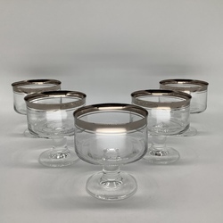 19th century.Antique bowls with a thick stem.Silver edging.Biedermeer.Crystal.