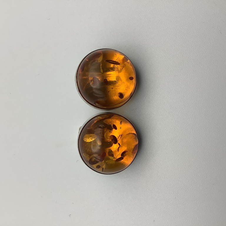 Antique silver clips from Baltic amber with incuse. Art Deco. Beginning of the last century.
