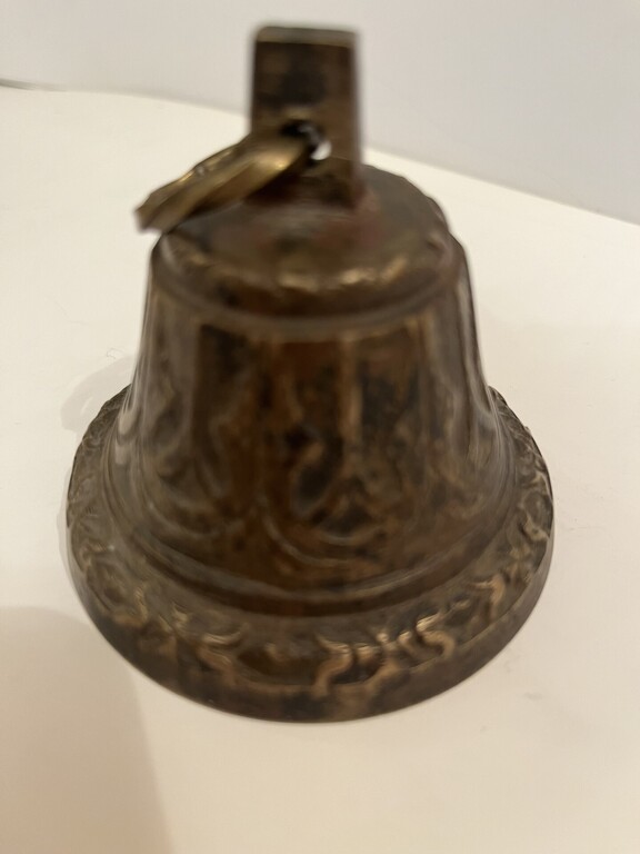 A bell with an inscription inside