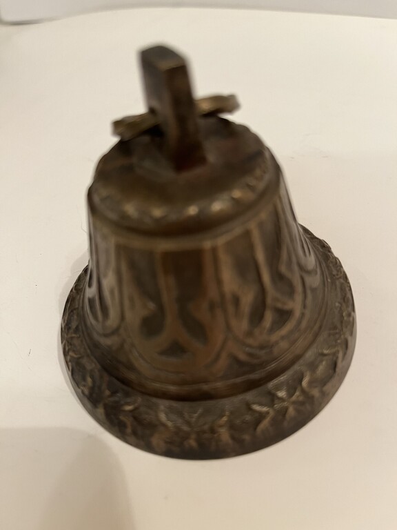 A bell with an inscription inside