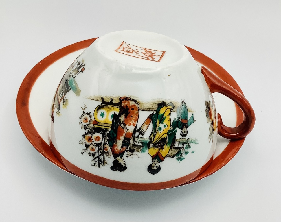 Antique Chinese tea pair with hand painting. Made of the finest porcelain and in good condition. Rare hallmark