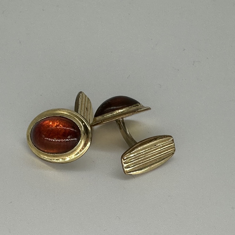 Cufflinks for a shirt. Gilded, inlaid with solid amber 