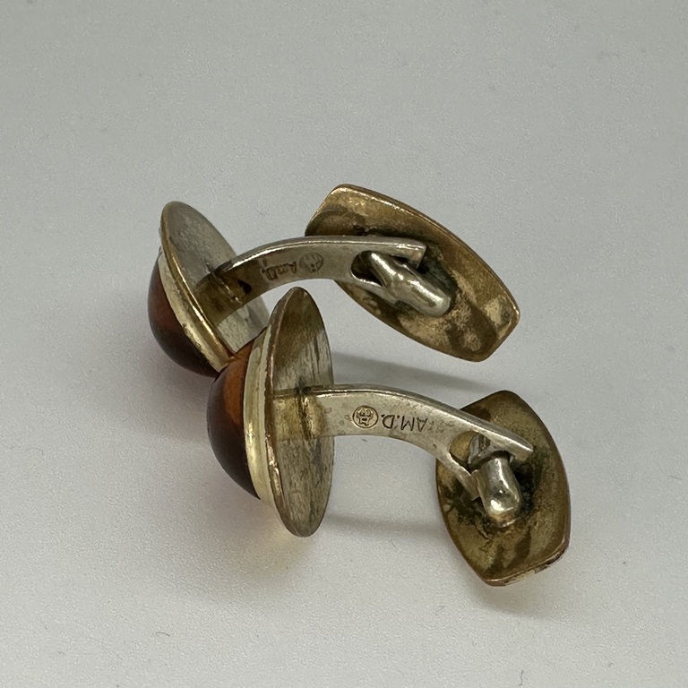 Cufflinks for a shirt. Gilded, inlaid with solid amber 