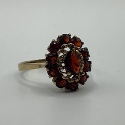 Gold ring with garnets. Biedermeier. Bohemia. Antique work.