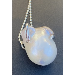 A large freshwater Baroque pearl pendant on a silver chain.