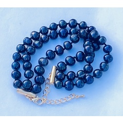 Three-row bracelet with dark blue freshwater pearls.