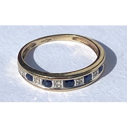 Gold ring 375 proof. Blue sapphires and diamonds?