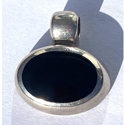 Vintage silver pendant with black stone.