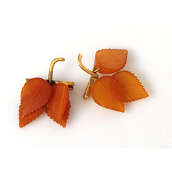 Two amber brooches 