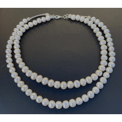 Double row necklace with white sweet pearls and silver elements. Handmade.