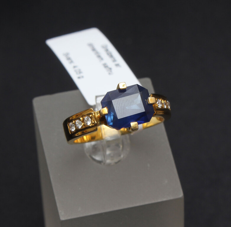Gold ring with synthetic sapphire and diamonds