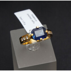 Gold ring with synthetic sapphire and diamonds