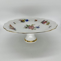 Tall cake dish with a skirt leg. Hand painted and elegant workmanship.