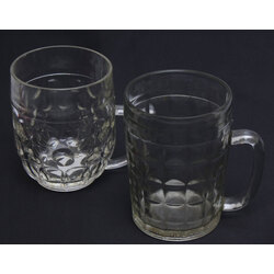 Two glass beer mugs