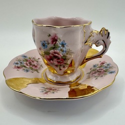 Coffee pair made of pink porcelain with hand painting and gold plating. Bohemia (Old Czechoslovakia)