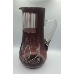 Violet glass jug with decorative grinding