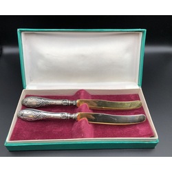 A set of gold-plated silver dessert knives 