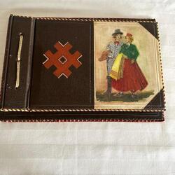 Vintage sketchbook bound in leather. On the cover there is a painting (Roman Suta?) Handmade by an old master. A rarity.