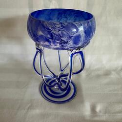 Vase made of double-layer cobalt glass on an elegant leg. 