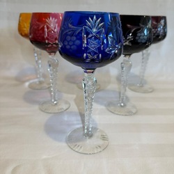 Large wine glasses on a high stem made of colored Bohemian crystal. 21 cm. Pre-war.