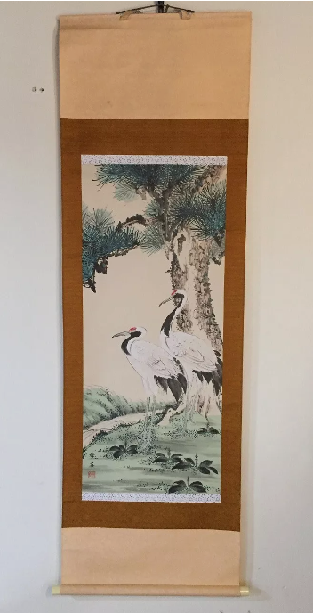 A pine tree and two Japanese cranes