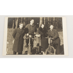 Photograph 2 men with women and bicycles