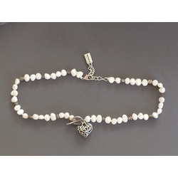 Natural freshwater pearl necklace with heart pendant.