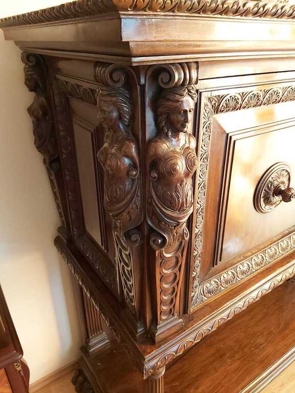 Sideboard with female figures