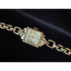 golden wristwatch