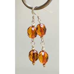 Silver earrings with amber, diamond cut.