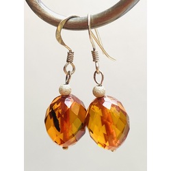 Silver earrings with amber, diamond cut.