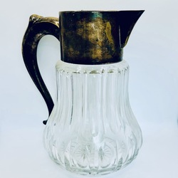 Caraf for lemonade .Large, heavy jug made of Swedish crystal .19th century, wide edges and silver-plated handle 