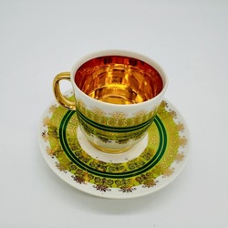 Coffee pair of rare form. Czechoslovakia. Hand painted and gold