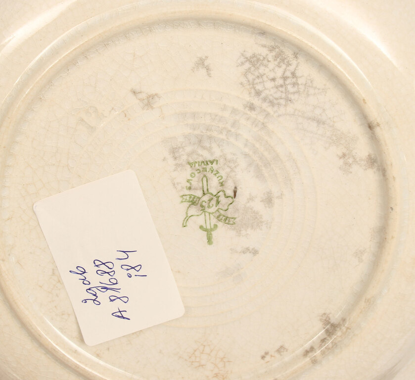 Two deep faience plates