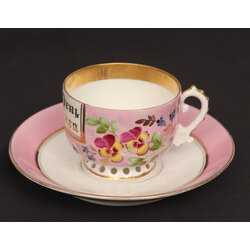 Porcelain cup with saucer