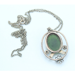 Silver chain and pendant with green stone