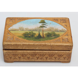 A wooden casket with a painting