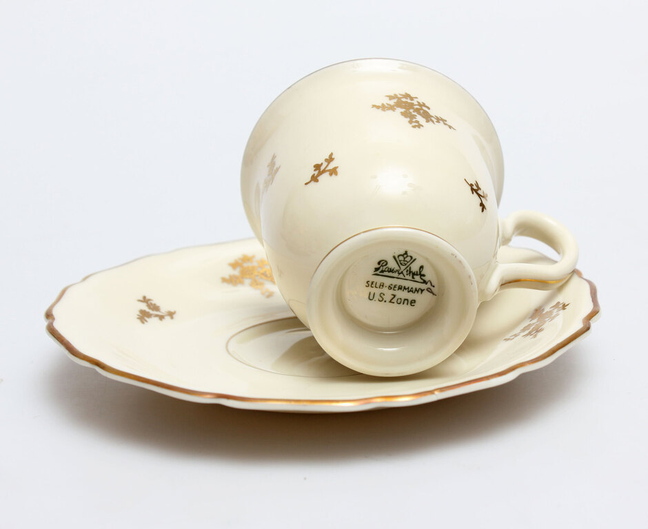 Porcelain cup with gilding