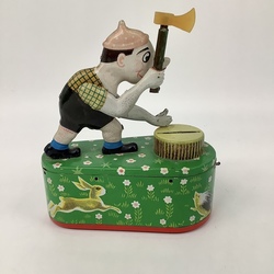 For a collector of children's toys. An old tin woodcutter.