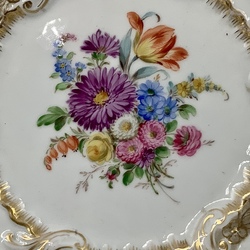 Meissen plate with figured edge and hand painting. Bouquet of flowers. 19th century.