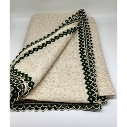 Tablecloth made of homespun cloth. Trimmed with hand-woven braid in national style.