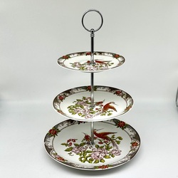 Hand-painted porcelain shelving unit. Garden of Eden motif.  