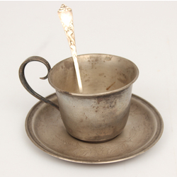 Silver cup with saucer and spoon