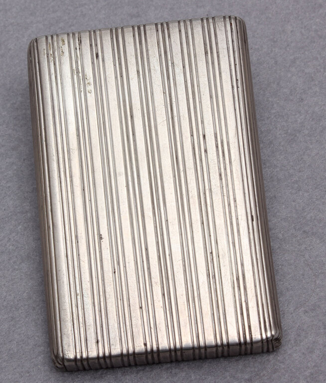 Silver cigarette holder with gold inlays